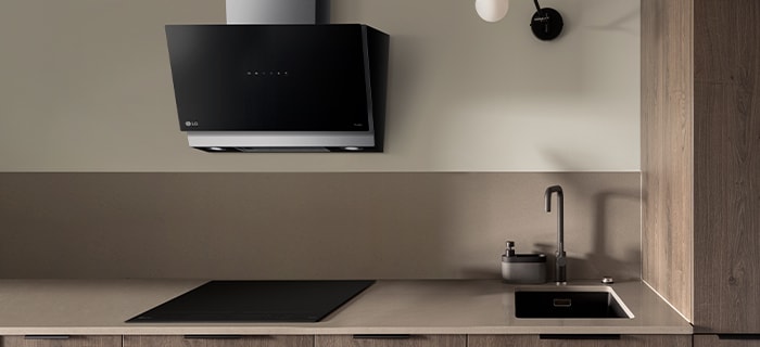 This is an image of LG built-in induction hob and hood installed in the kitchen.