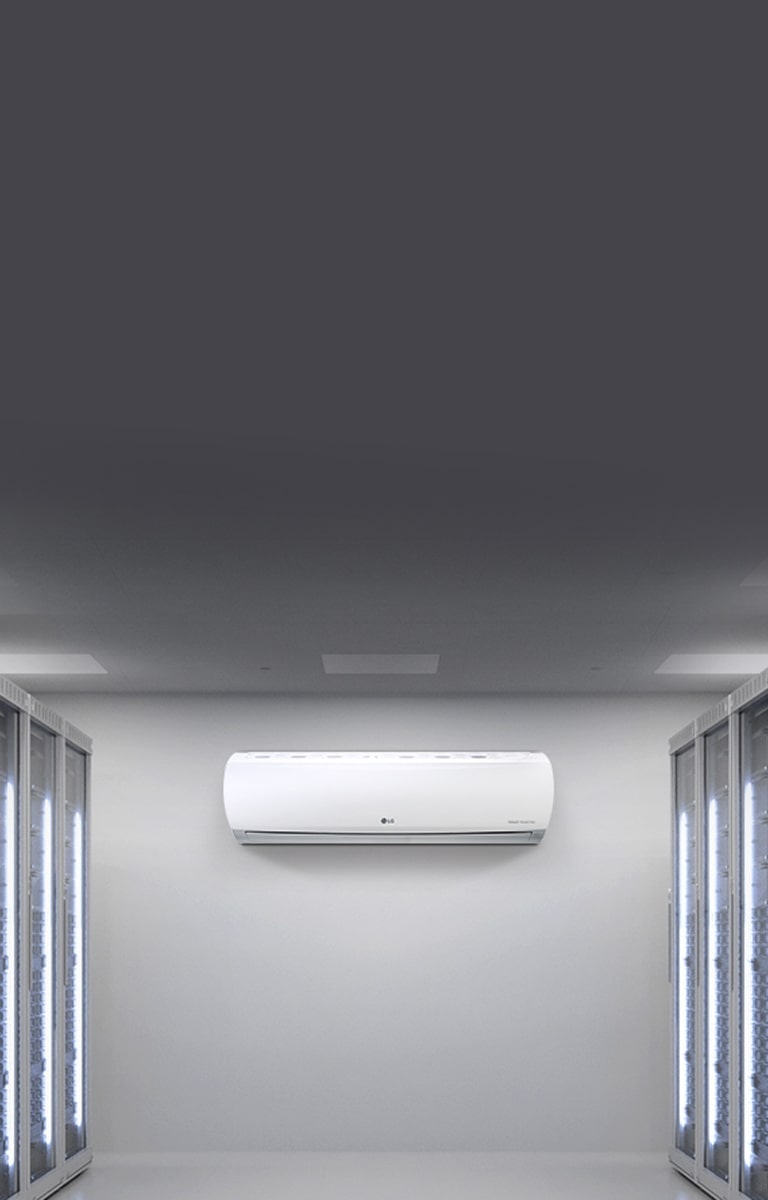 LG Wall Mounted unit placed in the center of a room that resembles a server room, with two racks situated on each side of the room, left and right.