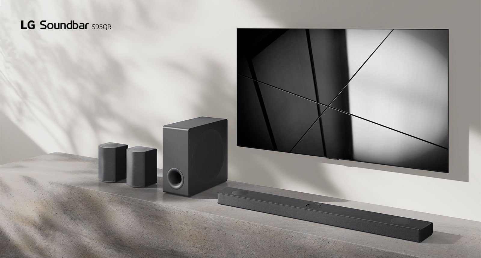 LG sound bar S95QR and LG TV are placed together in the living room. The TV is on, displaying a black and white image.