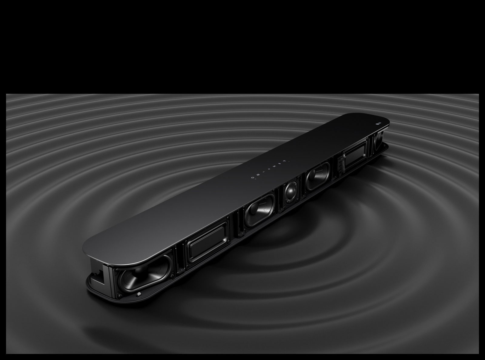 Image of 4 passive radiators placed inside of Soundbar . Underneath the Soundbar  circled black waves are shown for illustraing its powerful bass sound.