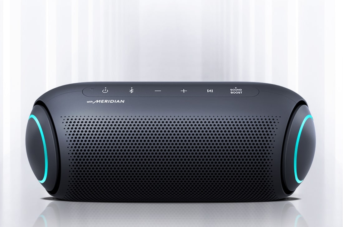 LG XBOOM Go PL7 30W Portable Bluetooth Speaker with Meridian Audio Technology, Light shines from the surroundings and the front of the XBOOM Go with blue lighting on either end is visible., PL7