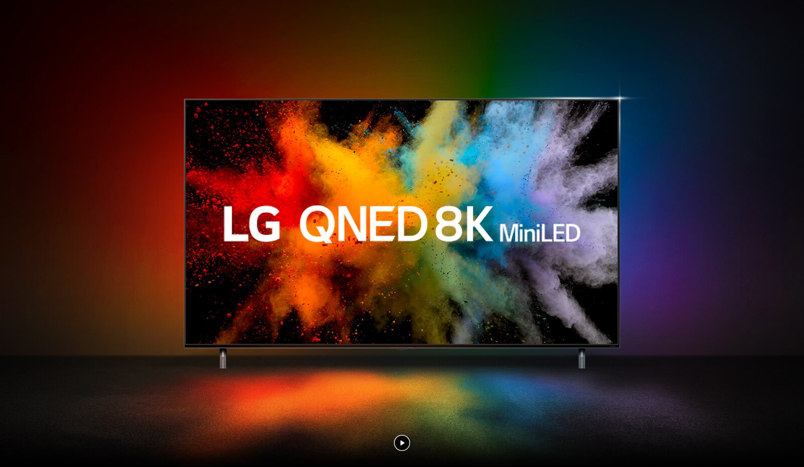 Typo-motion of QNED and NanoCell overlap and explode into color powder. LG QNED miniLED logo appears on TV. 