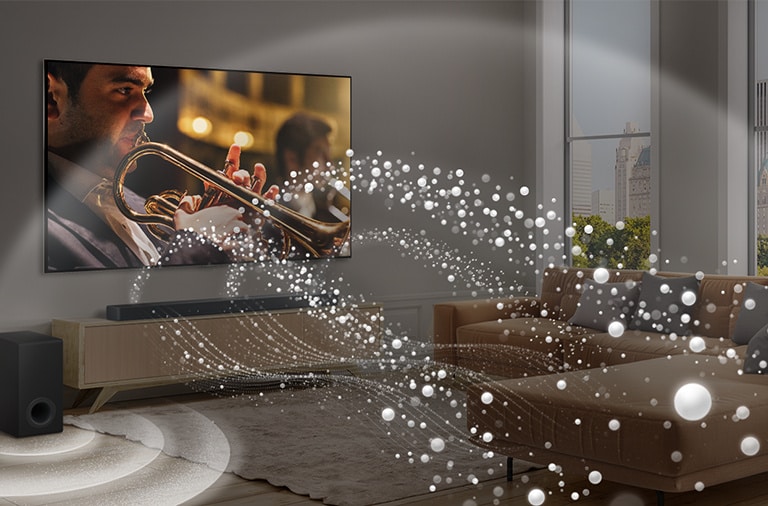 LG TV, LG Soundbar und ein Subwoofer stehen in einer modernen Stadtwohnung. Die LG Soundbar strahlt Schallwellen aus wei?en Tr?pfchen aus, die den Raum füllen, und ein Subwoofer erzeugt einen Klangeffekt von unten. Gemeinsam erzeugen sie einen Kuppeleffekt im Raum.
