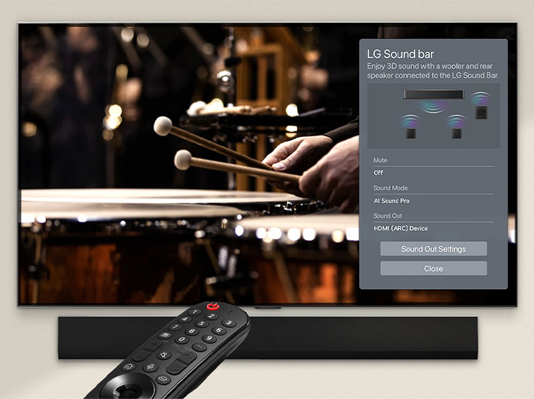 An image of an LG Soundbar, LG Remote, and  LG TV showing the WOW Interface on screen.