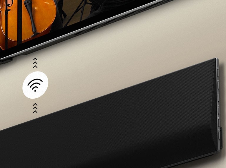 A close up image of an LG Soundbar below an LG TV. A connectivity symbol depicts WOWCAST's wireless operation.