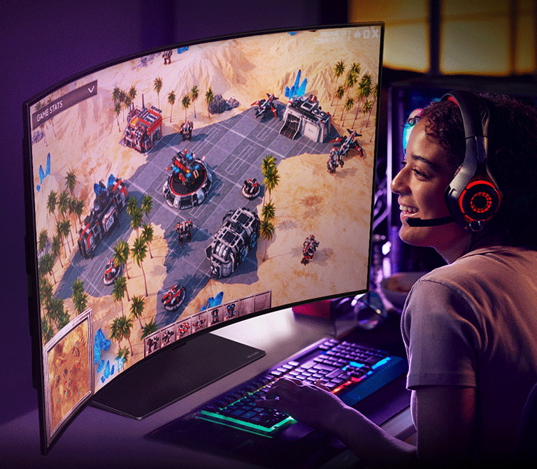 An image of a person gaming on LG OLED Flex. The right side of the screen has SAR technology applied and shows just the game graphics. The left side of the screen is non-SAR and has a reflection of the gamer's face.