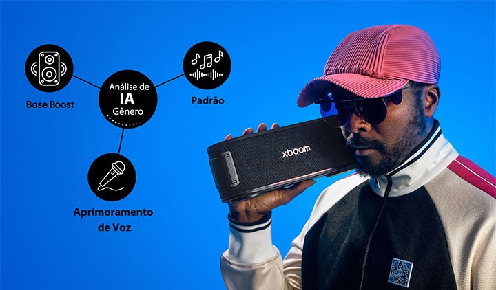 will.i.am está segurando uma xboom Bounce bem ao lado de seu rosto.