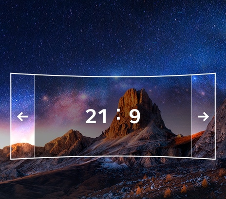 Uma imagem exibindo uma propor??o de 21:9 é mostrada na tela do monitor com um fundo de paisagem natural.