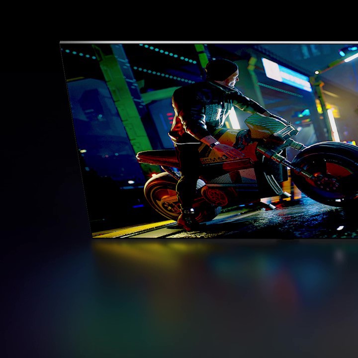 Uma vis?o lateral de 4 camadas de uma TV: uma luz de fundo, TFT e OLED, Filme e Vidro. A luz de fundo desaparece, e as outras 3 se juntam e ent?o giram para cima para mostrar a TV completa de uma vis?o frontal.