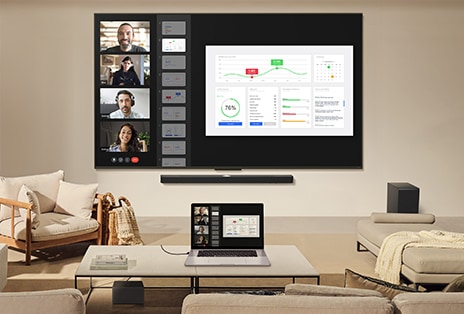 LG TV montée sur un mur au-dessus d’une LG Soundbar. Bo?te Zero Connect placée sous une table basse.