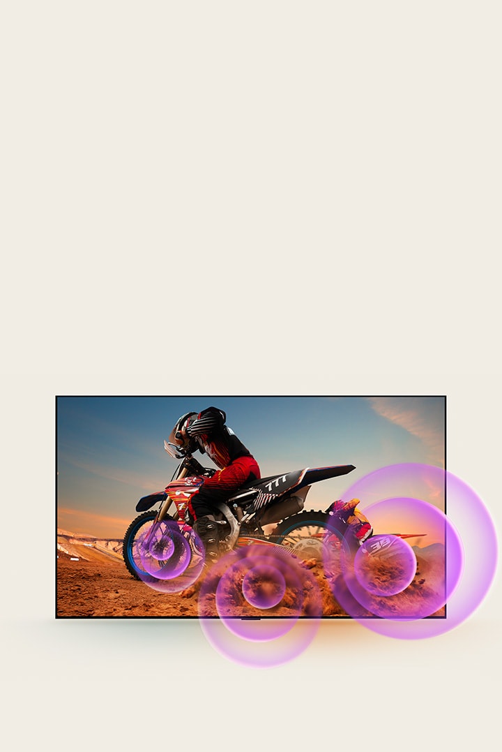 LG OLED TV zobrazuje mu?e na motocyklu, z jeho? kola vycházejí fialové abstraktní kruhy, které vizualizují vyza?ování zvuku.