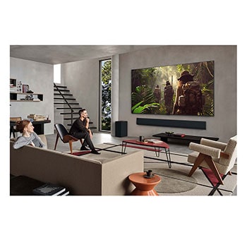 two people watching tv