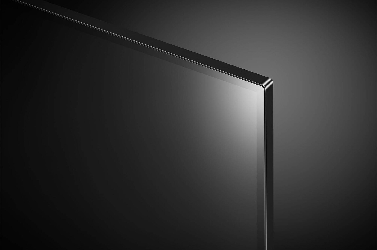 Nahaufnahme der oberen rechten Bildschirm-Ecke des LG OLED AI B4 4K Smart TV mit ultradünner Blende und gl?nzender Oberfl?che.