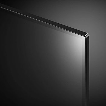 Nahaufnahme der oberen rechten Bildschirm-Ecke des LG OLED AI B4 4K Smart TV mit ultradünner Blende und gl?nzender Oberfl?che.
