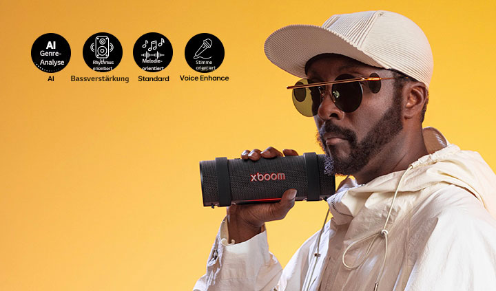 will.i.am h?lt den xboom Grab direkt neben sein Gesicht. 