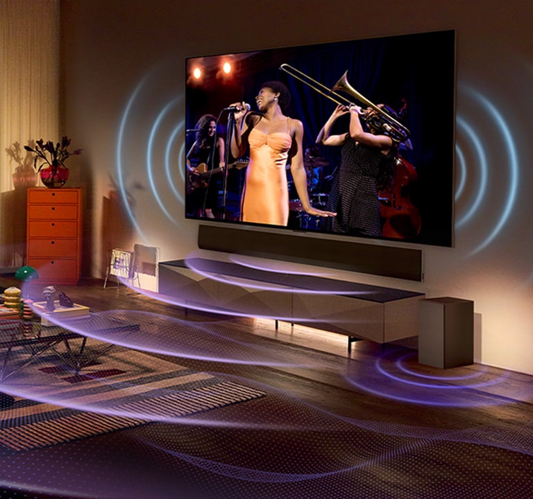 Ein Bild eines LG OLED TV in einem Raum, gezeigt wird ein Musikkonzert. Blaue gebogene Linien, die den Klang des Fernsehger?ts darstellen und violette gebogene Linien, die den Soundbar-Klang ausdrücken, füllen den Raum.