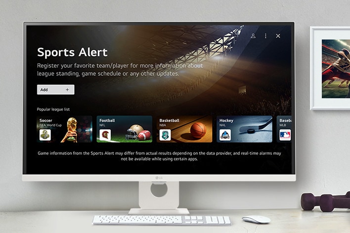 Der intelligente Monitor auf dem Tisch zeigt den Bildschirm der SPORT APP an.