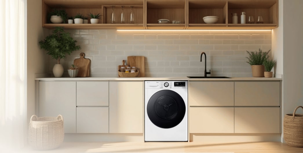 LG-Trockner in einer modernen Küche mit beigen Schr?nken und warmem Licht, perfekt integriert und funktional.