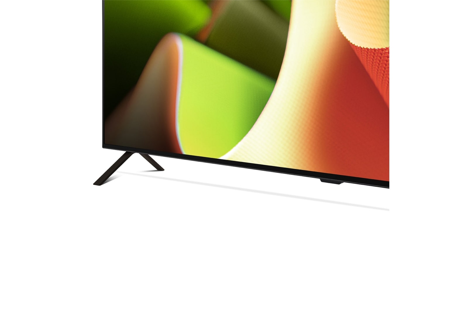 Primer plano del LG OLED TV, OLED B4 desde la base, mostrando el soporte de 2 polos