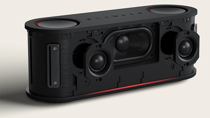 Las unidades internas de xboom Bounce, woofer y tweeters, se muestran con sus tweeters moviéndose hacia delante y vibrando rítmicamente.