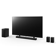 Vue inclinée de LG QNED 165?cm, de la LG Soundbar S75TR et du caisson de basse