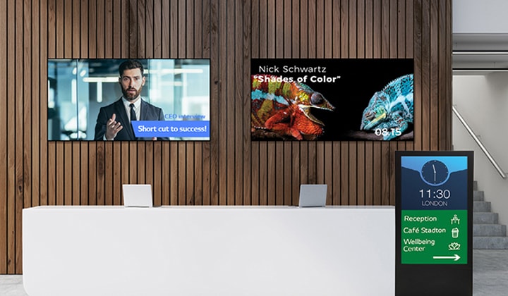 Différents types d’écrans sont installés dans le hall de l’entreprise.