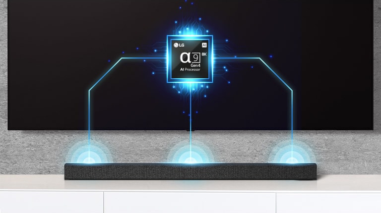 On peut voir l’image d’une puce Alpha?9 sur le téléviseur et une barre de son juste en dessous. On peut aussi voir des effets d'ondes sonores sortant de la barre de son.