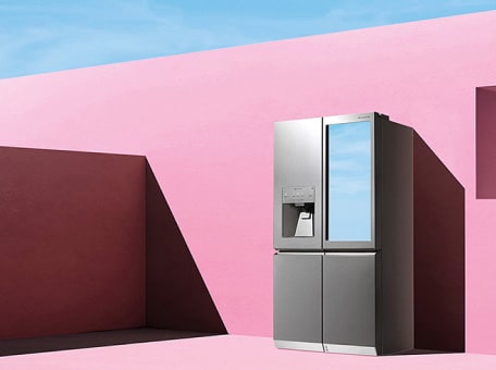 lg signature refrigerator on the artistic pink wall