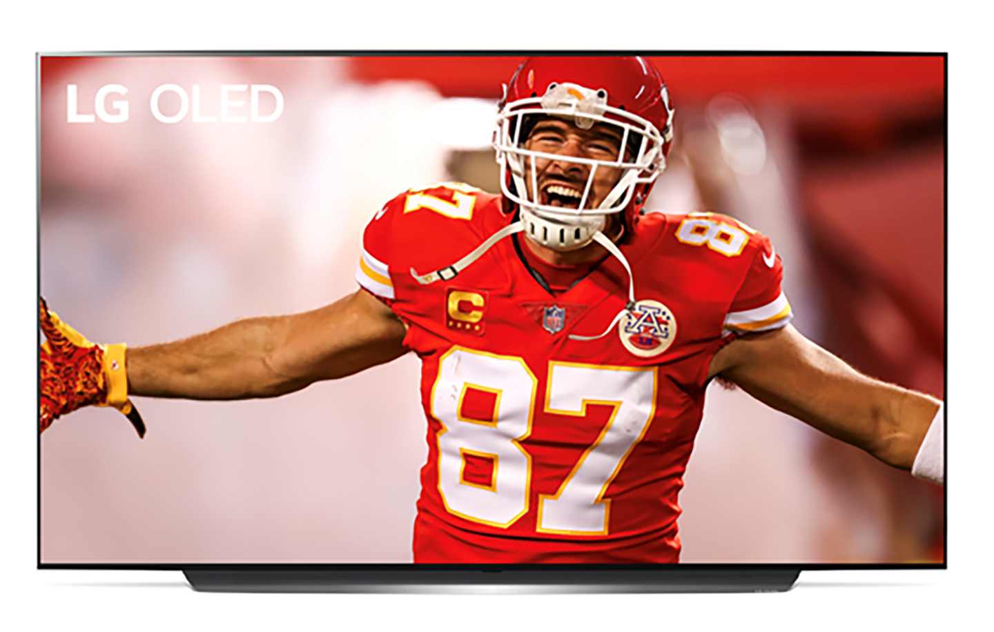 Image of Travis Kelce, Kansas City Chiefs’ tight end, celebrating a touchdown displayed on an LG OLED TV.