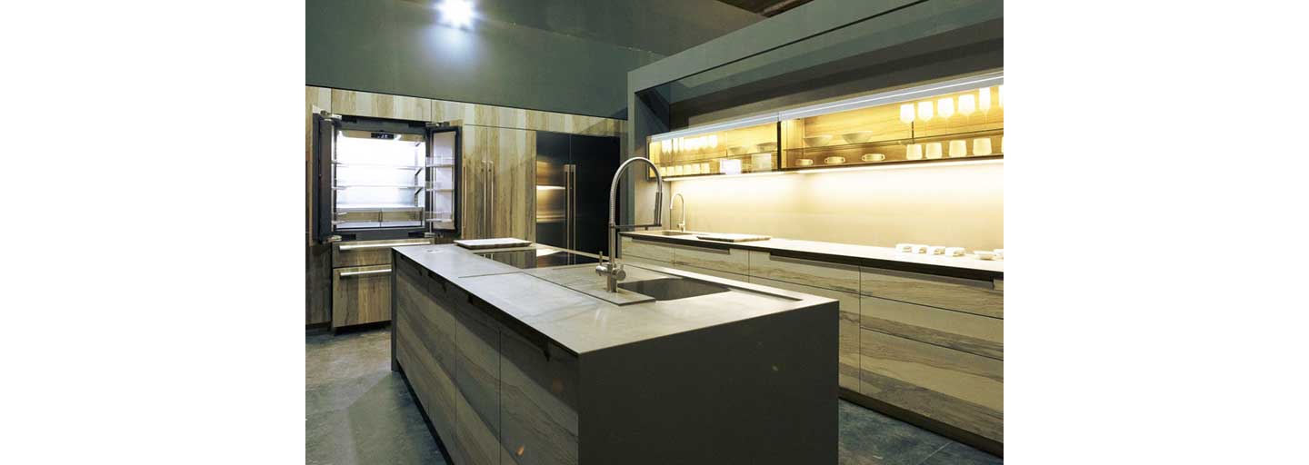 A kitchen with SIGNATURE KITCHEN SUITE built-in appliances