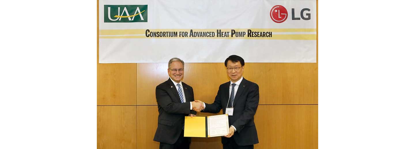 At the ceremony for the consortium for advanced heat pump research in Alaska, Thomas Yoon (CEO of LG Electronics North America), Sean Parnell (chancellor of the University of Alaska Anchorage), and James Lee (head of the Air Solution Business Unit at LG Electronics) are standing next to each other from left to right