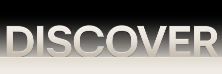 黑色漸變背景上的「Discover」(探索)字樣