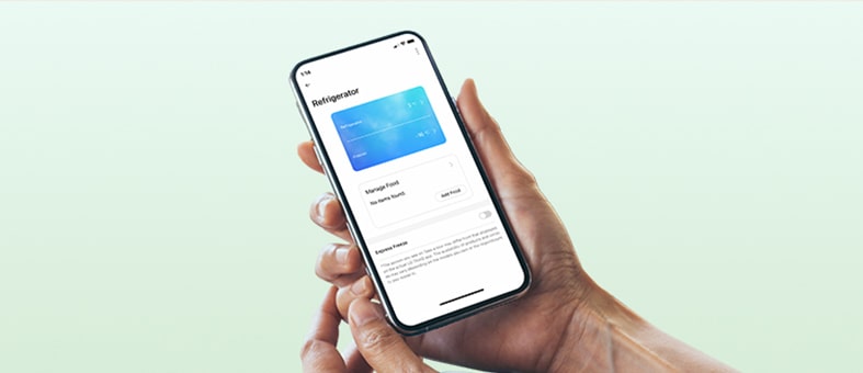 Hands holding a phone with LG ThinQ app on