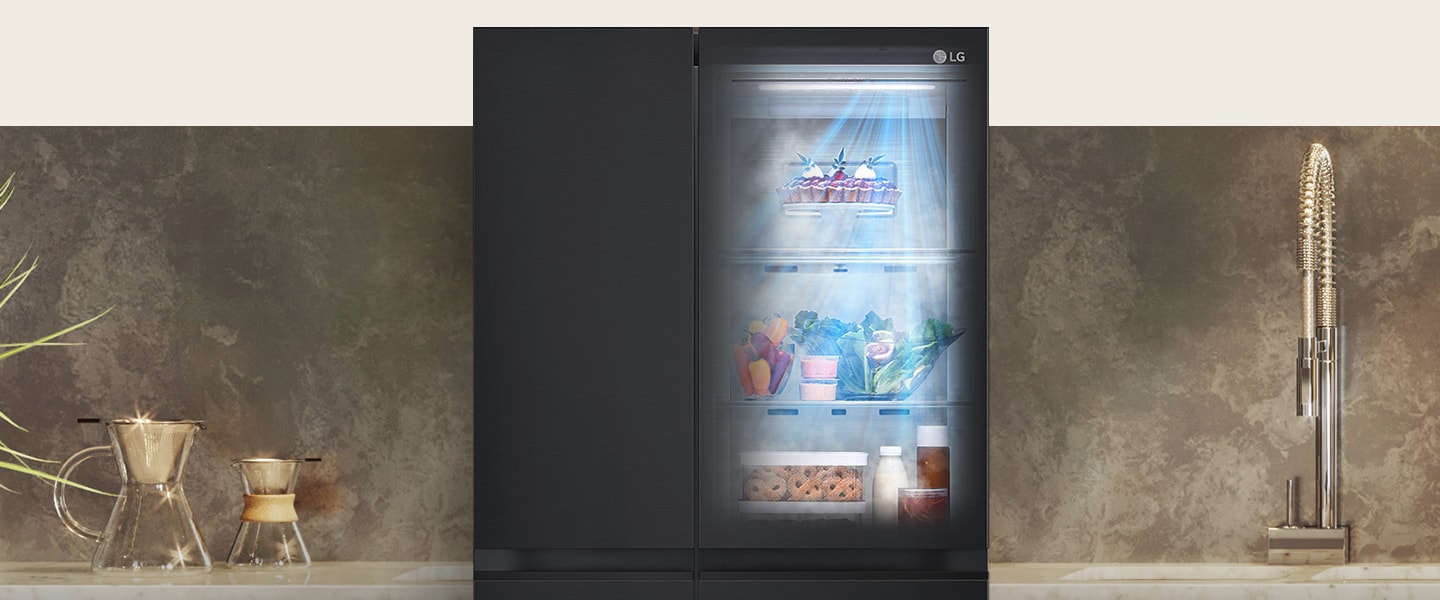The front view of a black InstaView refrigerator with the light on inside. The contents of the refrigerator can be seen through the InstaView door. Blue rays of light shine down over the contents from the DoorCooling function. 