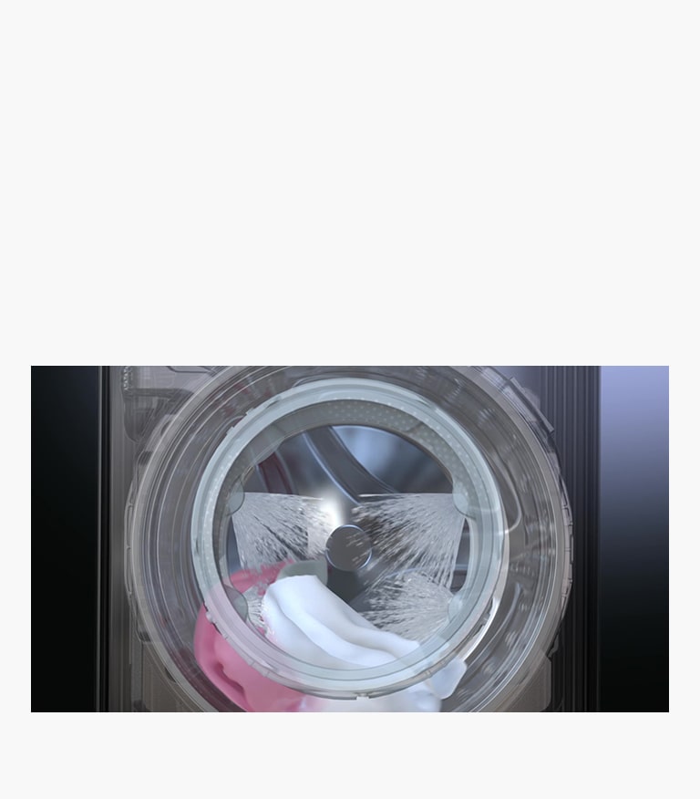 A képen a mosógép ajtaját látjuk. A vízsugár 4 kül?nb?z? irányból érkezik a sz?vetre.