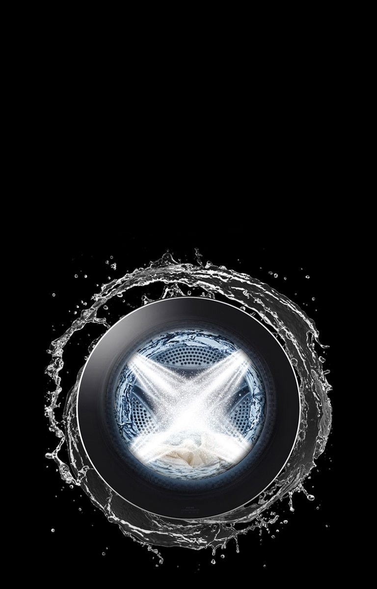 LG washing machine drum surrounded by water splash, highlighting powerful cleaning on a black background.