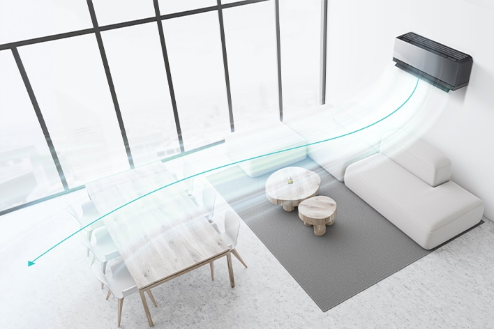 Woonkamer met LG airconditioner die dual vane gebruikt om de luchtstroom effici?nter over de eet- en bankzones te verdelen.