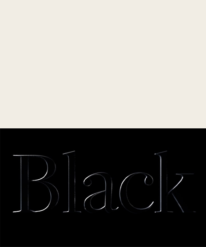 Le mot noir appara?t en relief sur un fond noir. 