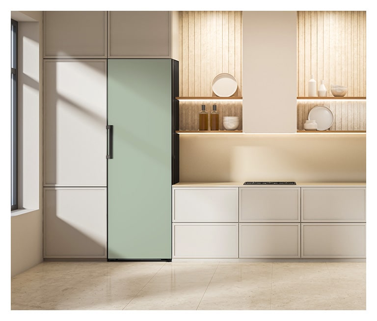 It shows mist mint color LG Larder Objet Collection is placed in the kitchen that matches naturally to the furniture around.