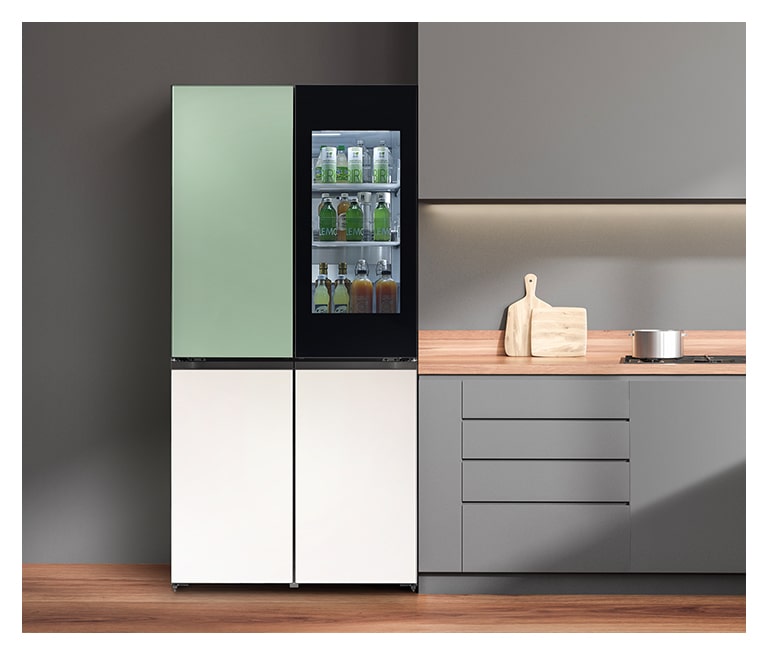 It shows mist mint&beige color LG French Door Objet Collection is built in a dark-tone modern kitchen.
