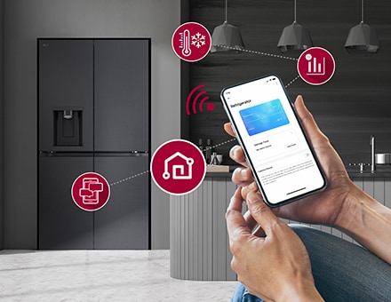  Smart phone is shown giving instructions to the fridge in background