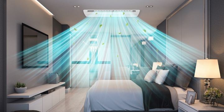 Dark tone bedroom with a large bed at the center. Overhead, a rectangular shape LG 1 way Cassette unit supplies airflow via its vane.