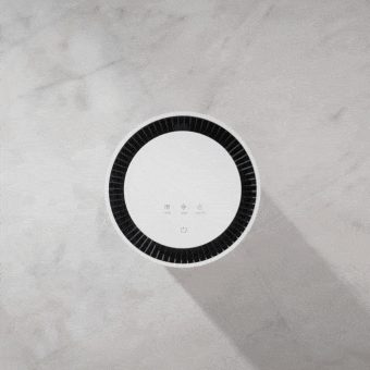 LG air purifier with 360 H Filter, capturing dust and releasing clean air in all directions	