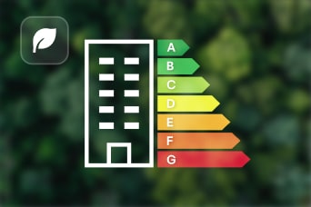 Wykres oceny efektywno?ci energetycznej i symbol budynku.	