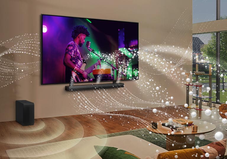 LG TV i LG Soundbar zamontowane na ?cianie w salonie i grafika o jasnym kszta?cie dooko?a pokoju.