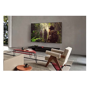 LG AI Magic Remote med AI-knappen markerad. Runt den visas de olika funktionerna som en anv?ndare kan komma ?t fr?n knappen. AI Voice ID, AI Search, AI Chatbot, AI Concierge, AI Picture Wizard, AI Sound Wizard. Texten f?rklarar att LG AI Magic Remote kompletterar din AI-upplevelse med en dedikerad AI-knapp och kan anv?ndas som en virtuell mus. Peka och klicka.