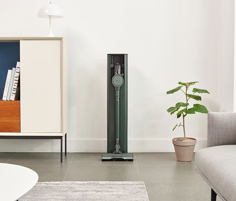 It shows calming green color LG CordZero All-in-One Tower Objet Collection is placed in the Living Room.