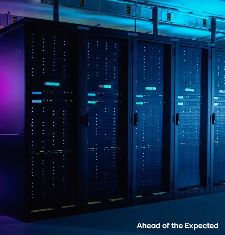 High-performance data center with illuminated server racks, advanced IT infrastructure.