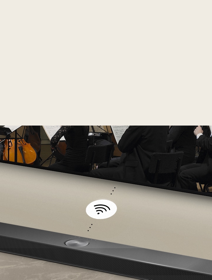 A close up image of an LG Soundbar below an LG TV. A connectivity symbol depicts WOWCAST's wireless operation.	