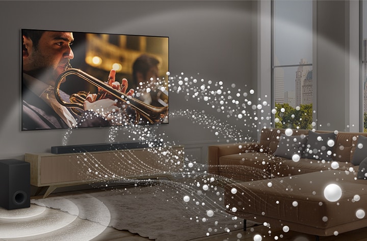 An image of an LG TV, LG Soundbar, and Subwoofer in a modern city apartment with soundwaves made of white droplets filling the room.	